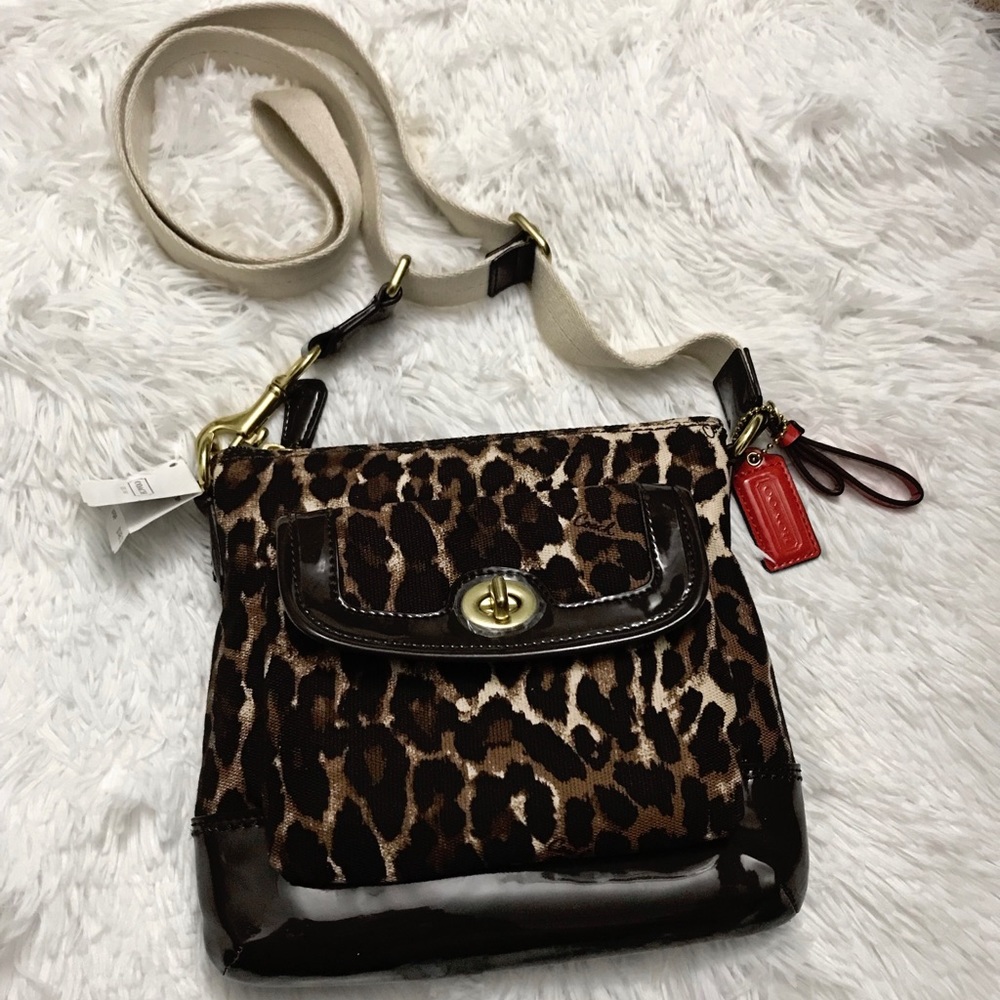 Animal print Coach purse w/ adjustable strap. NWT